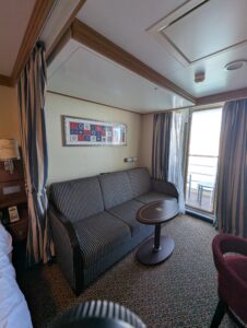 Convertible sofa and upper bunk pull down bed