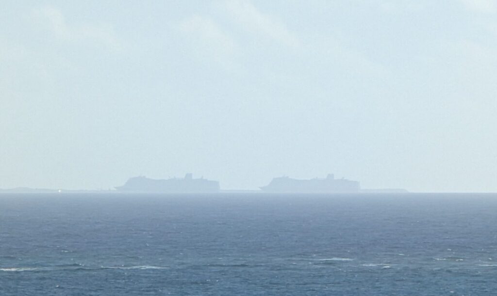 MS Koningsdam and MS Statendam docked at Half Moon Cay