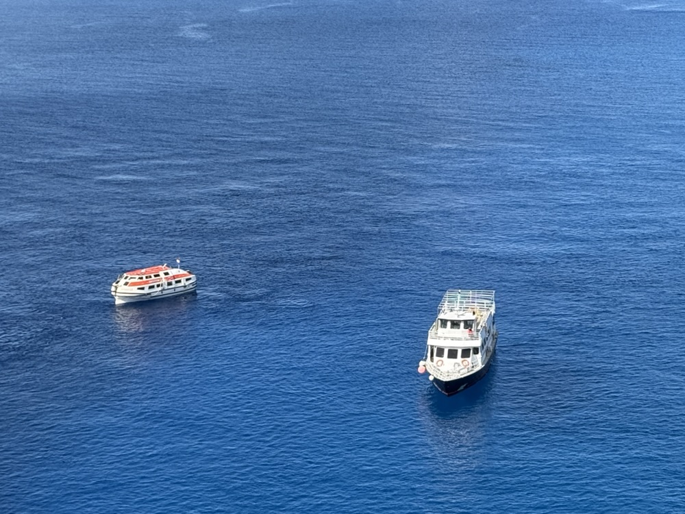 Half Moon Cay's large tender boats and both Rotterdam and Eurodam's lifeboats were used for getting guests ashore on Half Moon Cay