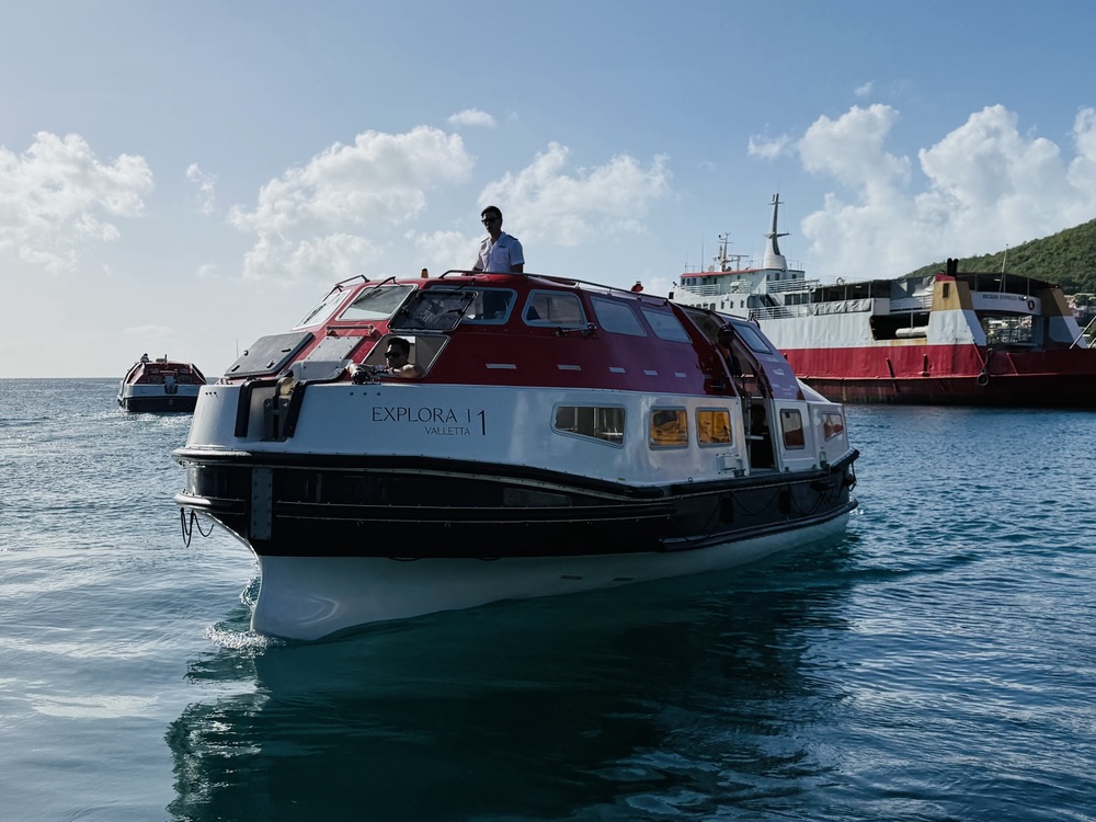 One of Explora I's tender lifeboats heading into the marina in Bequia