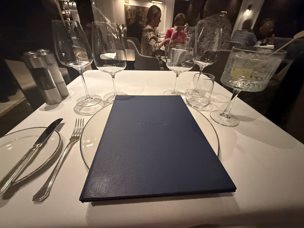 Place setting at Fil Rouge on Explora Journeys