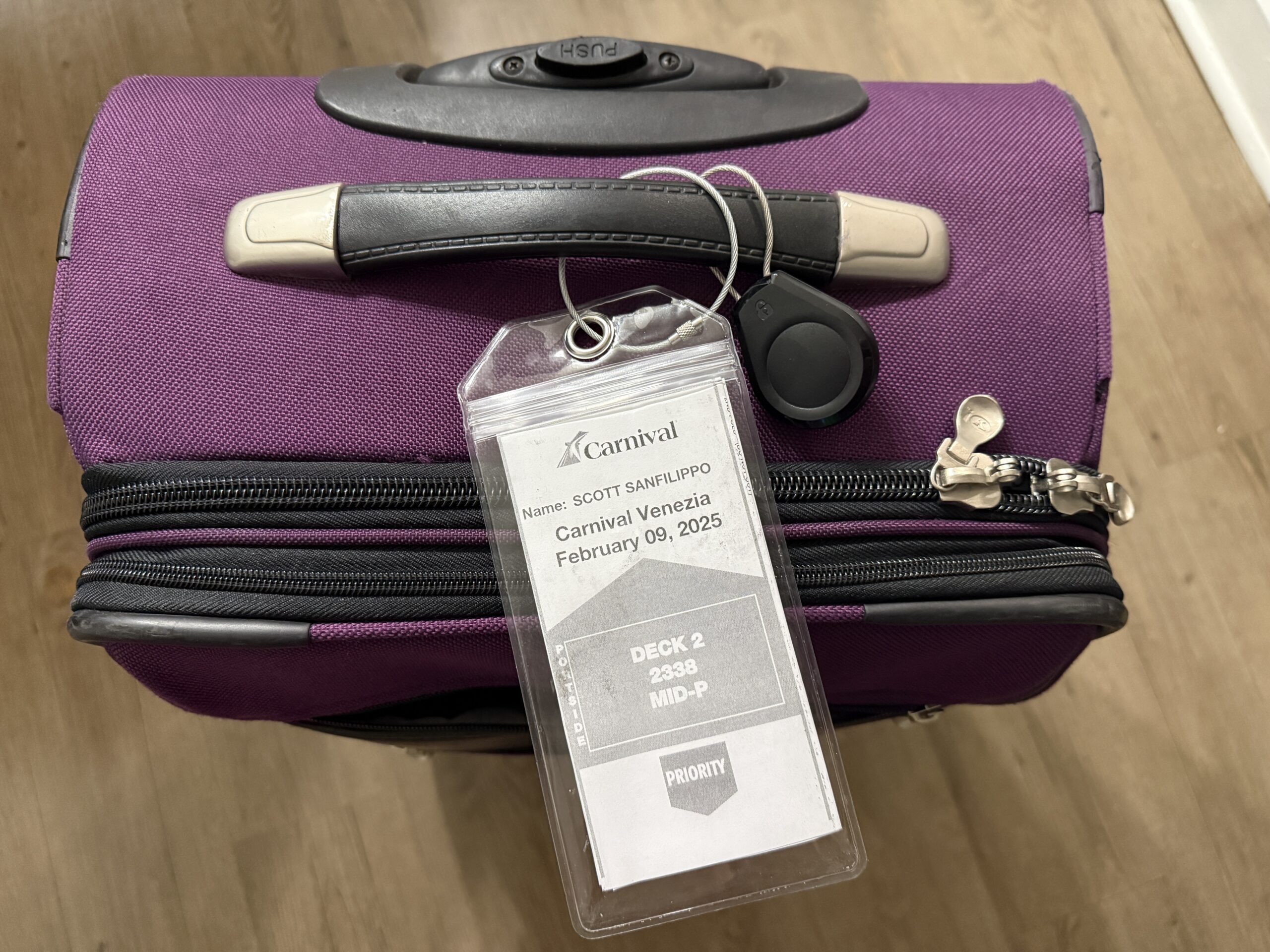 Plastic luggage tag holder with Carnival Cruise Line luggage tag