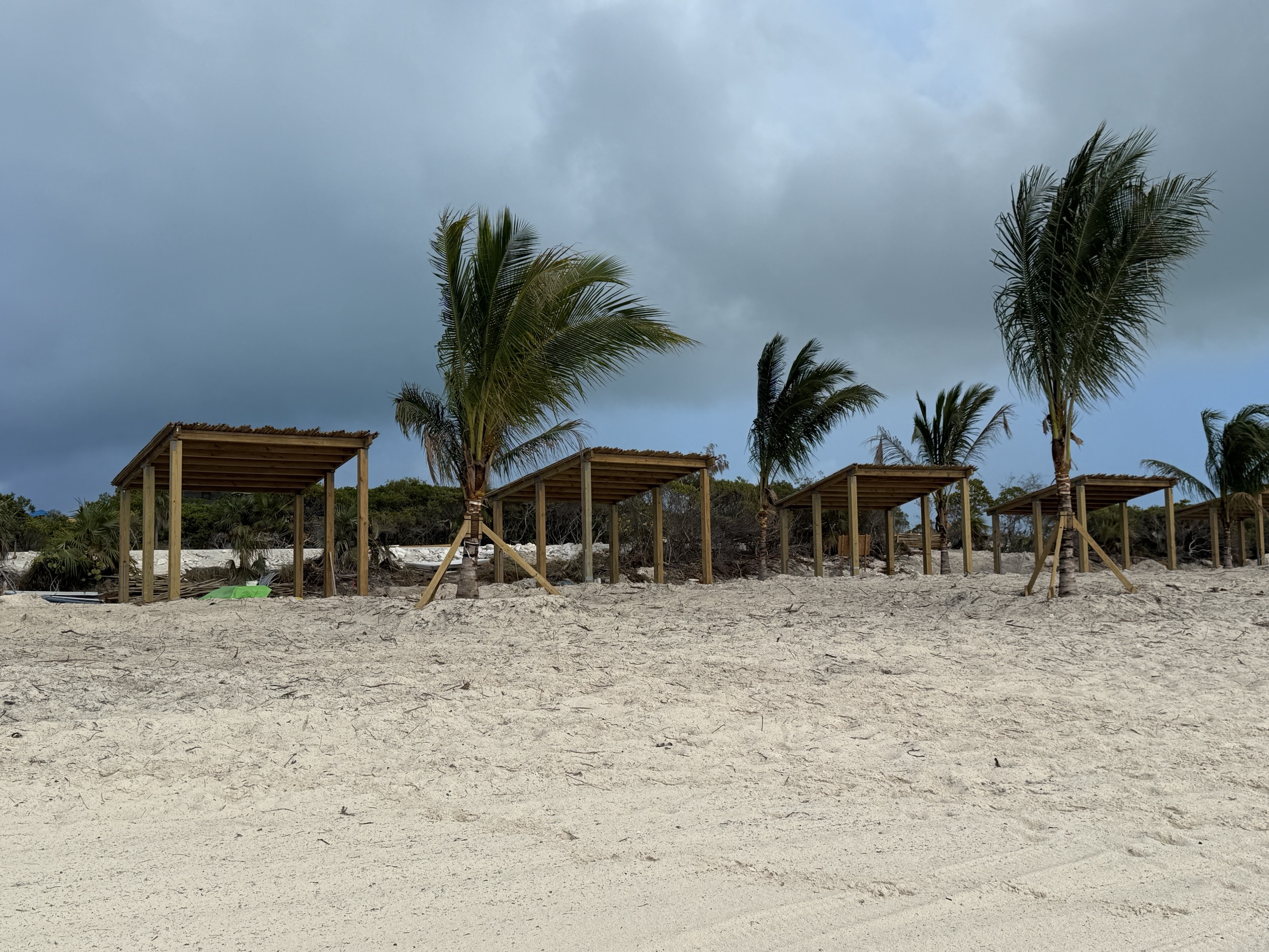 Construction on structures that may be cabanas on the beach at Half Mon Cay - March 2, 2026