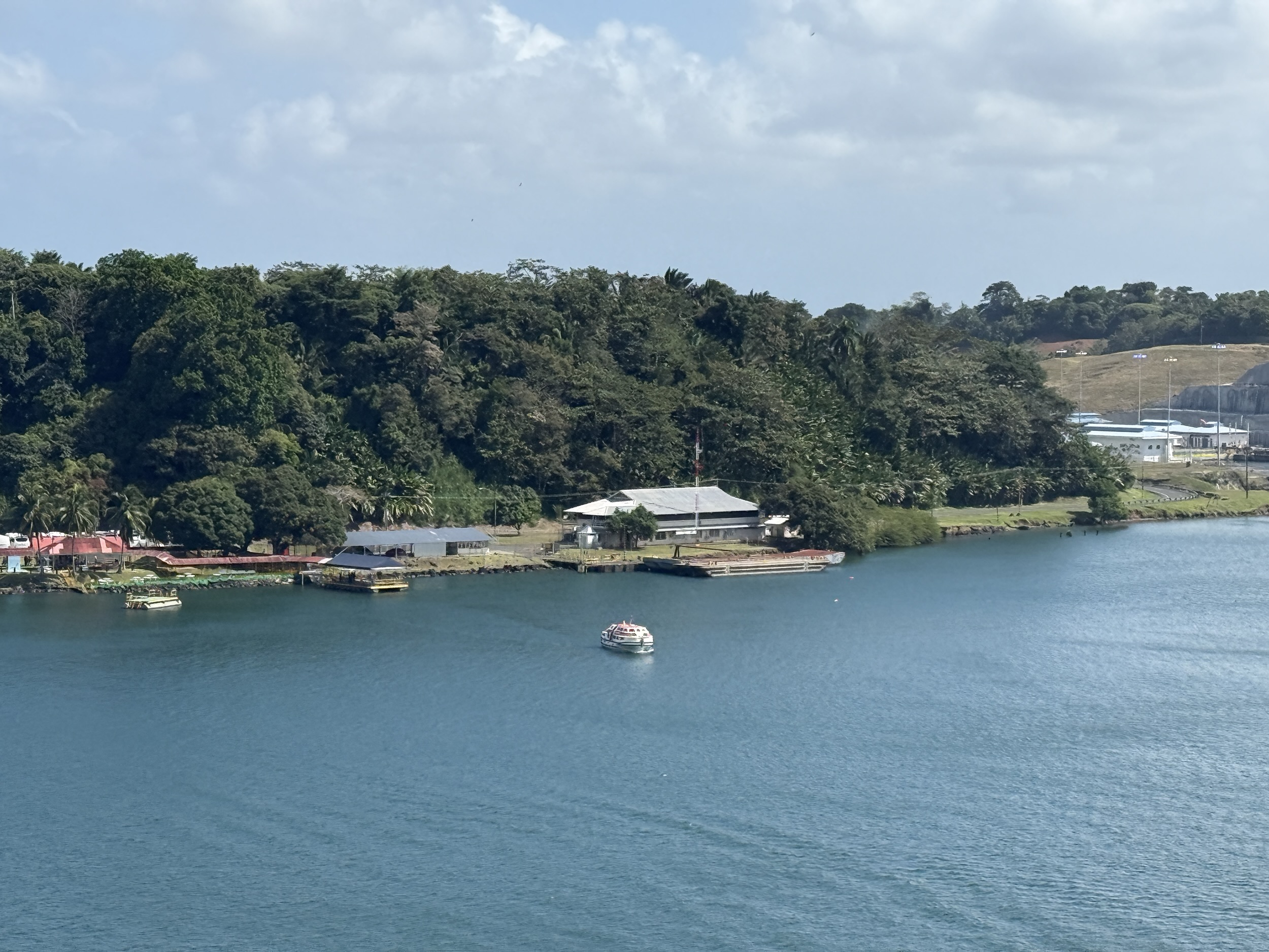 One of Rotterdam's lifeboats taking guests from the ship, anchored in Gatun Lake, ashore for a shore excursion