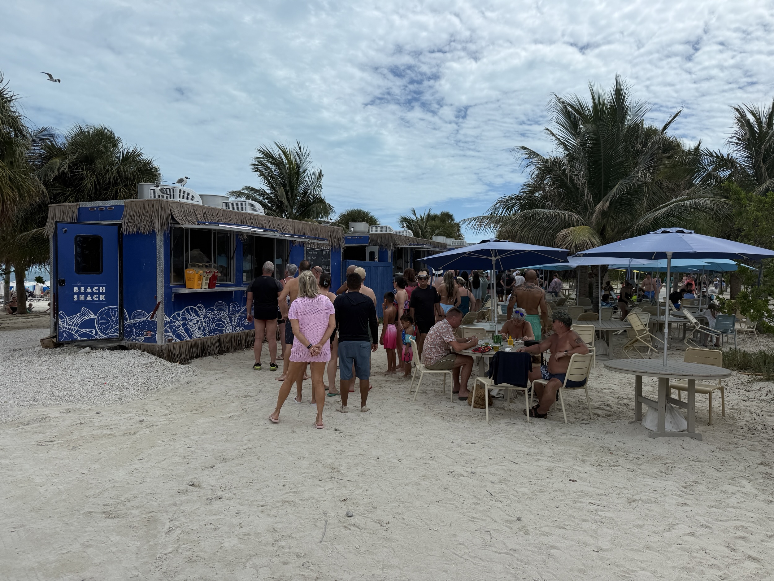 People lined up at the food trucks near North and Bimini Beaches on Ocean Cay