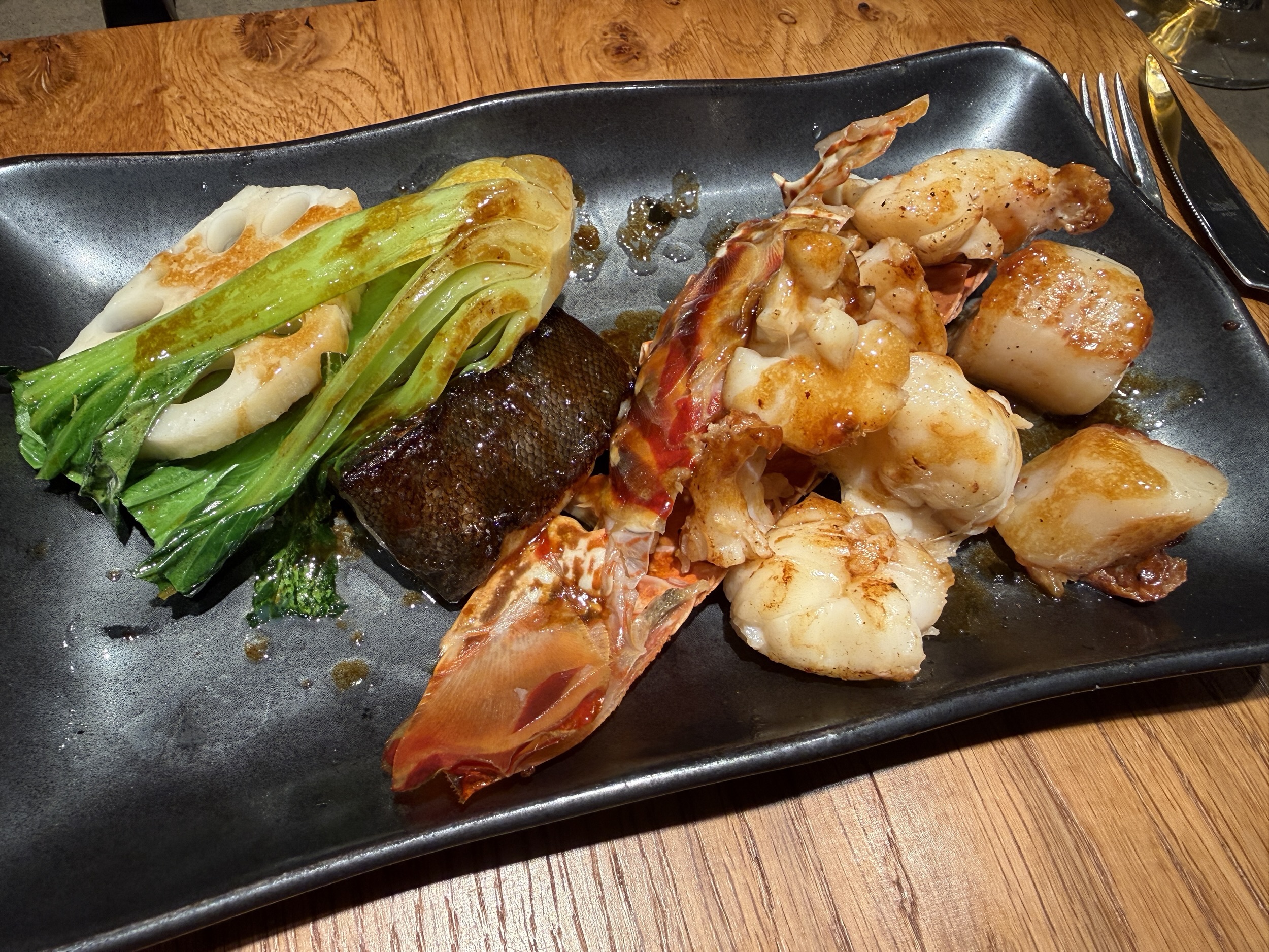 Lobster, scallops, and fish from Kaito Teppanyaki on MSC World America