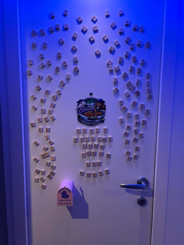 A stateroom door decorated with magnetic Scrabble letters.  Credit: Facebook